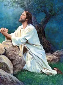Jesús Orando arrodillado
